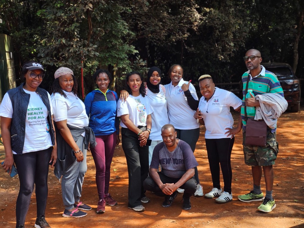 RPSKe members gathered by a waterfall after a forest walk